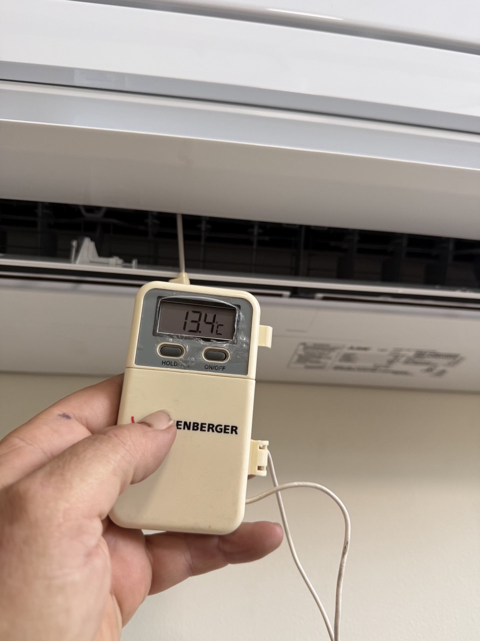 Temperature meter used during an electrical inspection